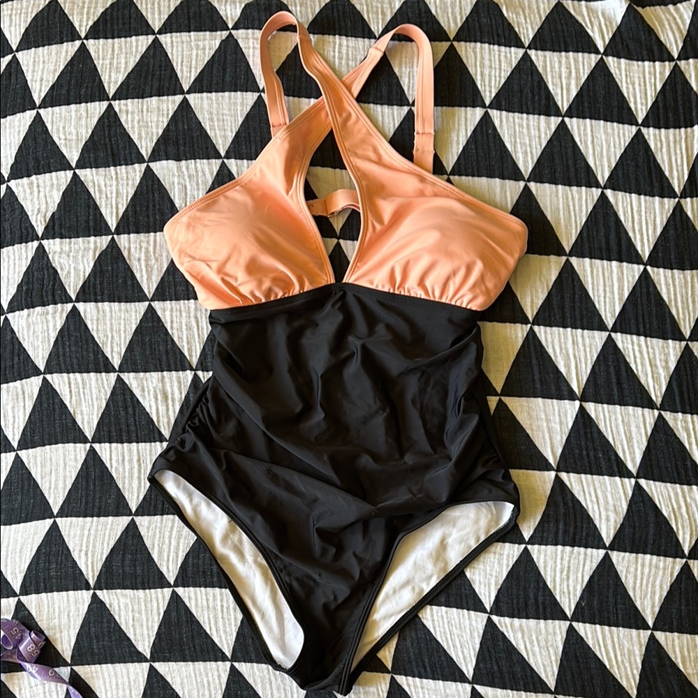 Pink and black one piece swimsuit